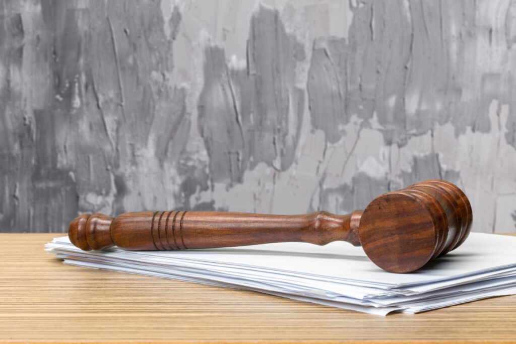 judge hammer white paper table